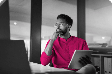 Man looking thoughtfully at screen